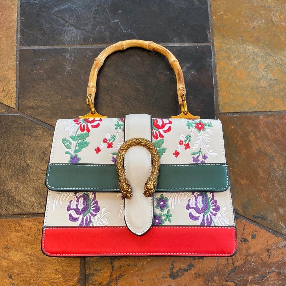 Looks like Gucci handbag